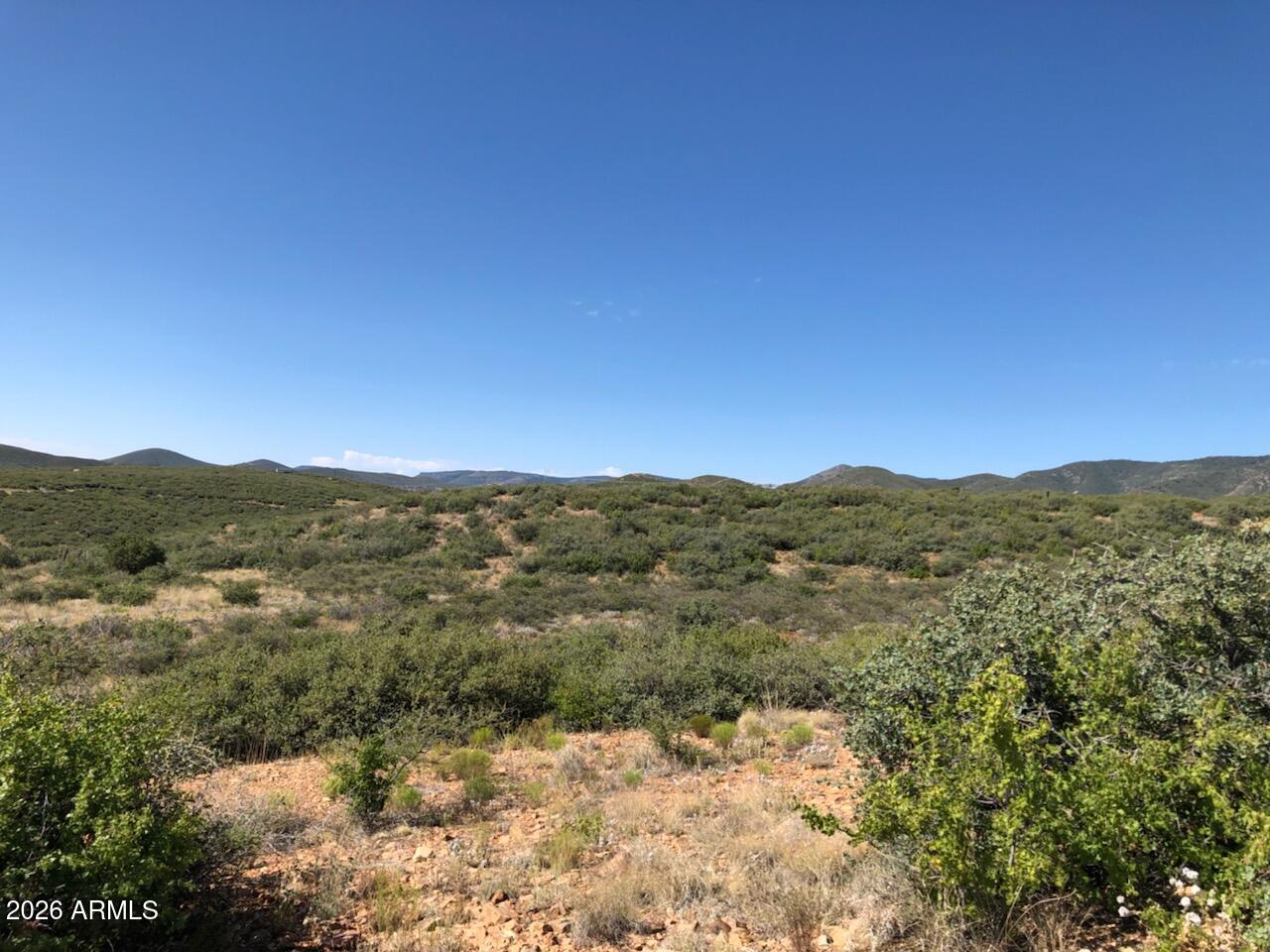 10424 East Prescott Dells Road, Unit 21 Dewey, AZ 86327 - Photo 2 of 6 a view of mountain view with mountains in the background