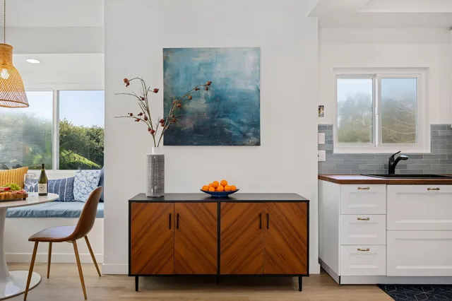 a view of a living room and bathroom