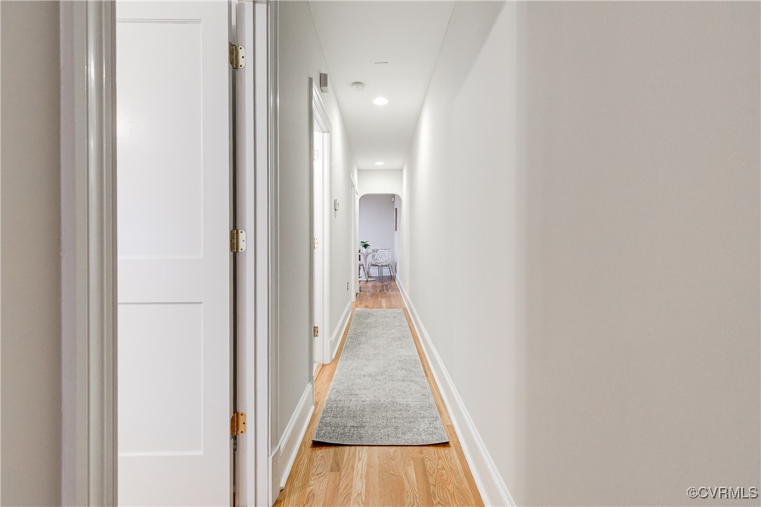 619 Roseneath Road, Unit U21 Richmond, VA 23221 - Photo 17 of 21 a view of a hallway with wooden floor and a bathroom