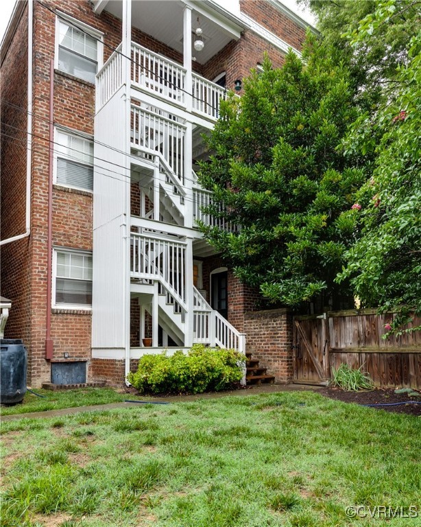 619 Roseneath Road, Unit U21 Richmond, VA 23221 - Photo 21 of 21 a front view of a house with a garden