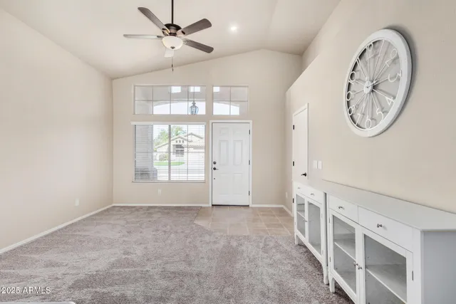a view of a hallway with front door
