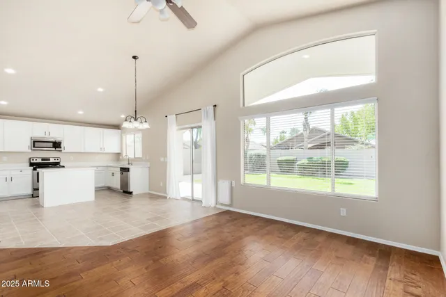 a view of kitchen with furniture and window