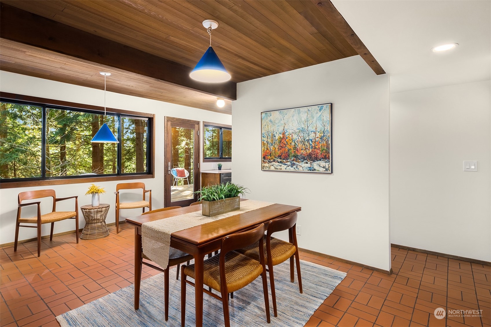 21088 88th Place West Edmonds, WA 98026 - Photo 11 of 37 a dining room with furniture a rug and a large window