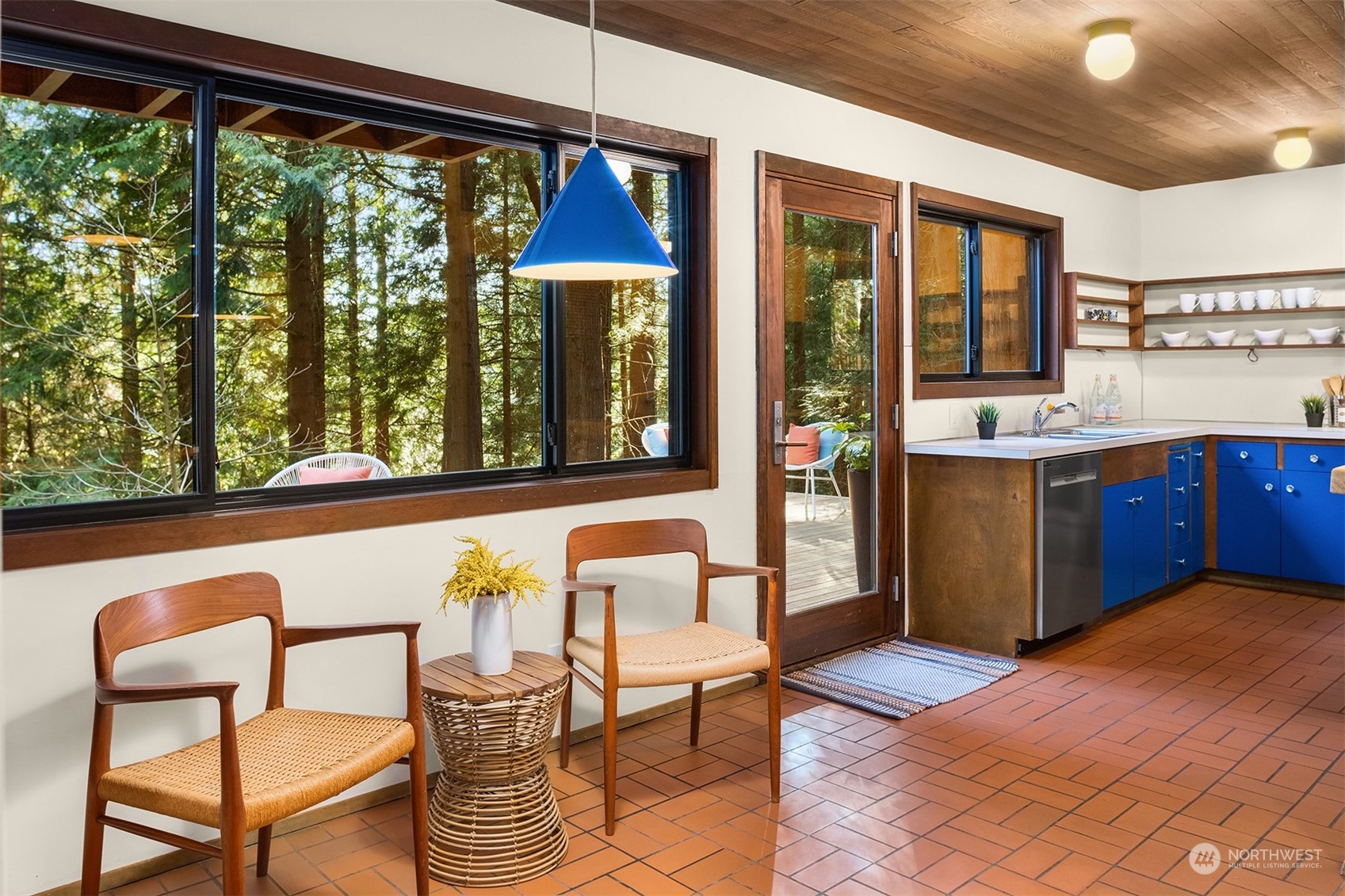 21088 88th Place West Edmonds, WA 98026 - Photo 16 of 37 a view of a dining room with furniture window and outside view