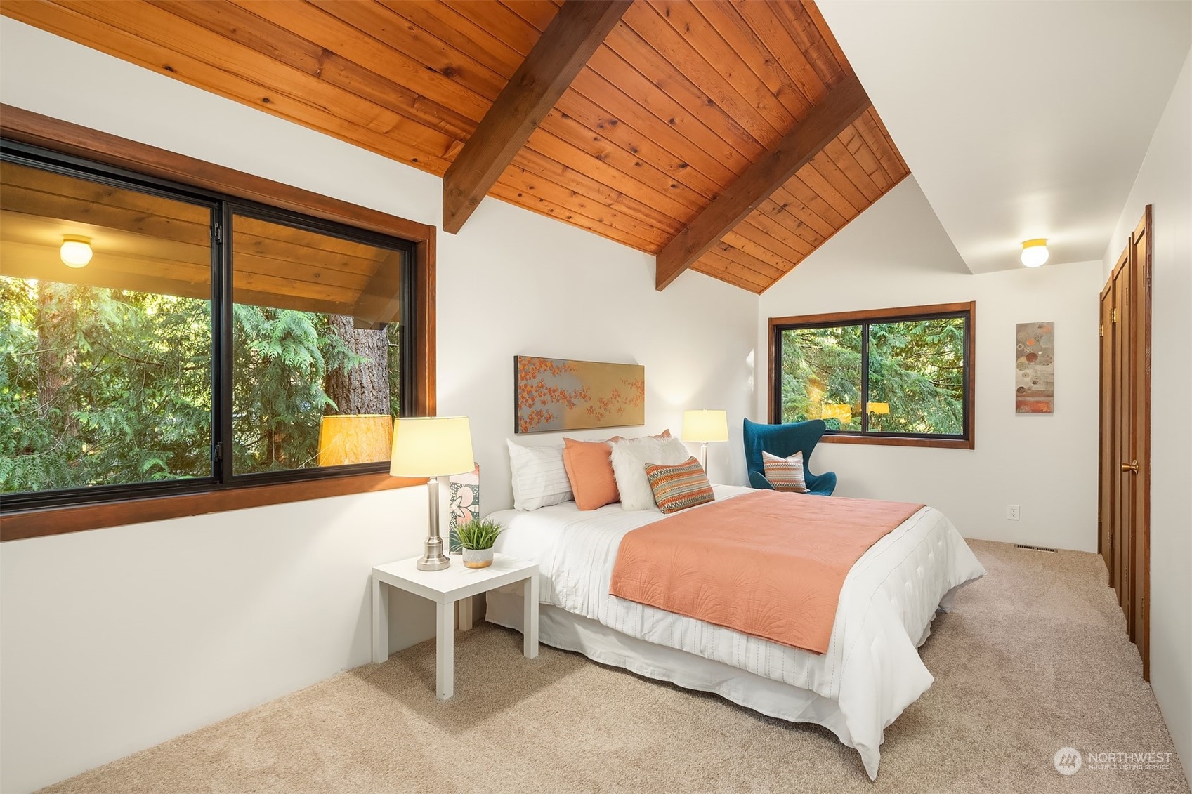21088 88th Place West Edmonds, WA 98026 - Photo 21 of 37 a bedroom with a large bed and a window