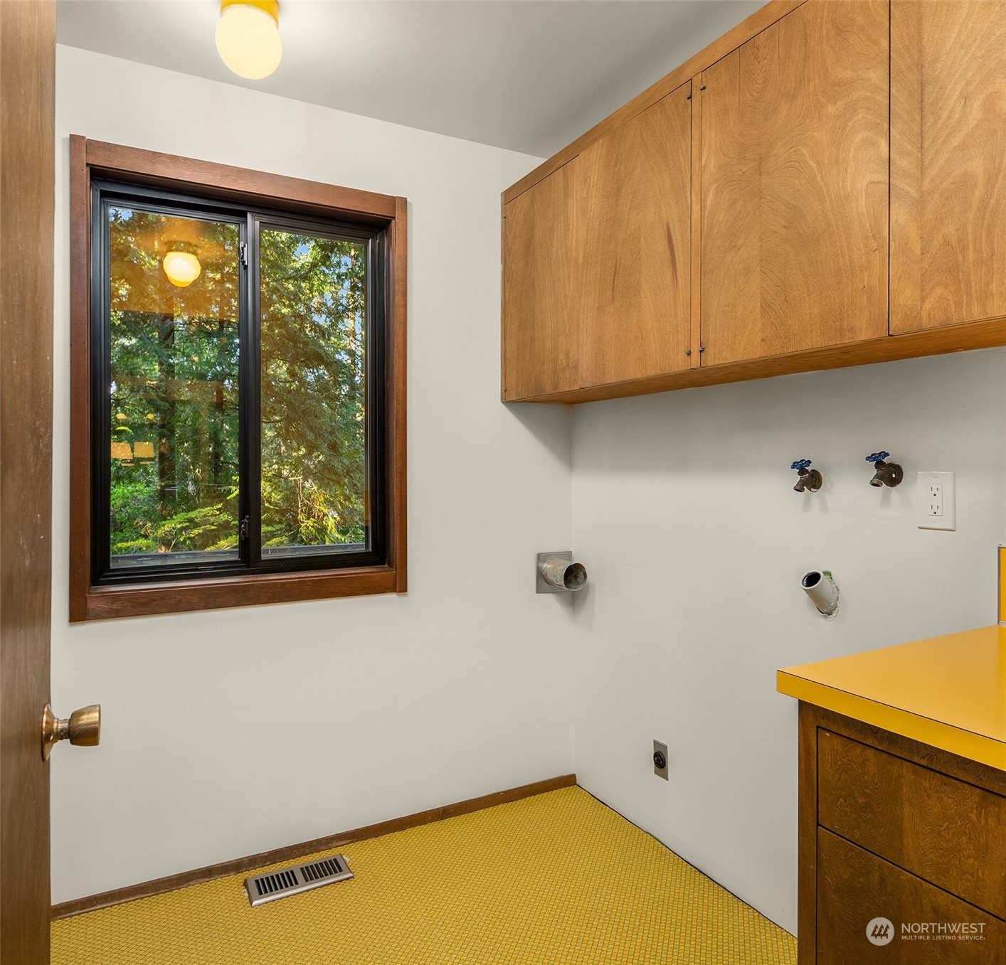 21088 88th Place West Edmonds, WA 98026 - Photo 32 of 37 a view of a room with wooden floor and window