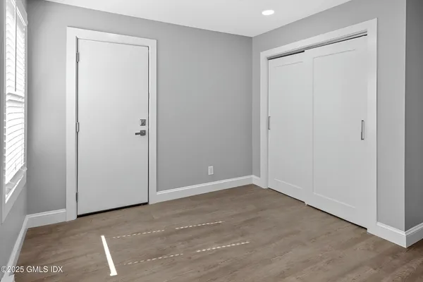 an empty room with windows