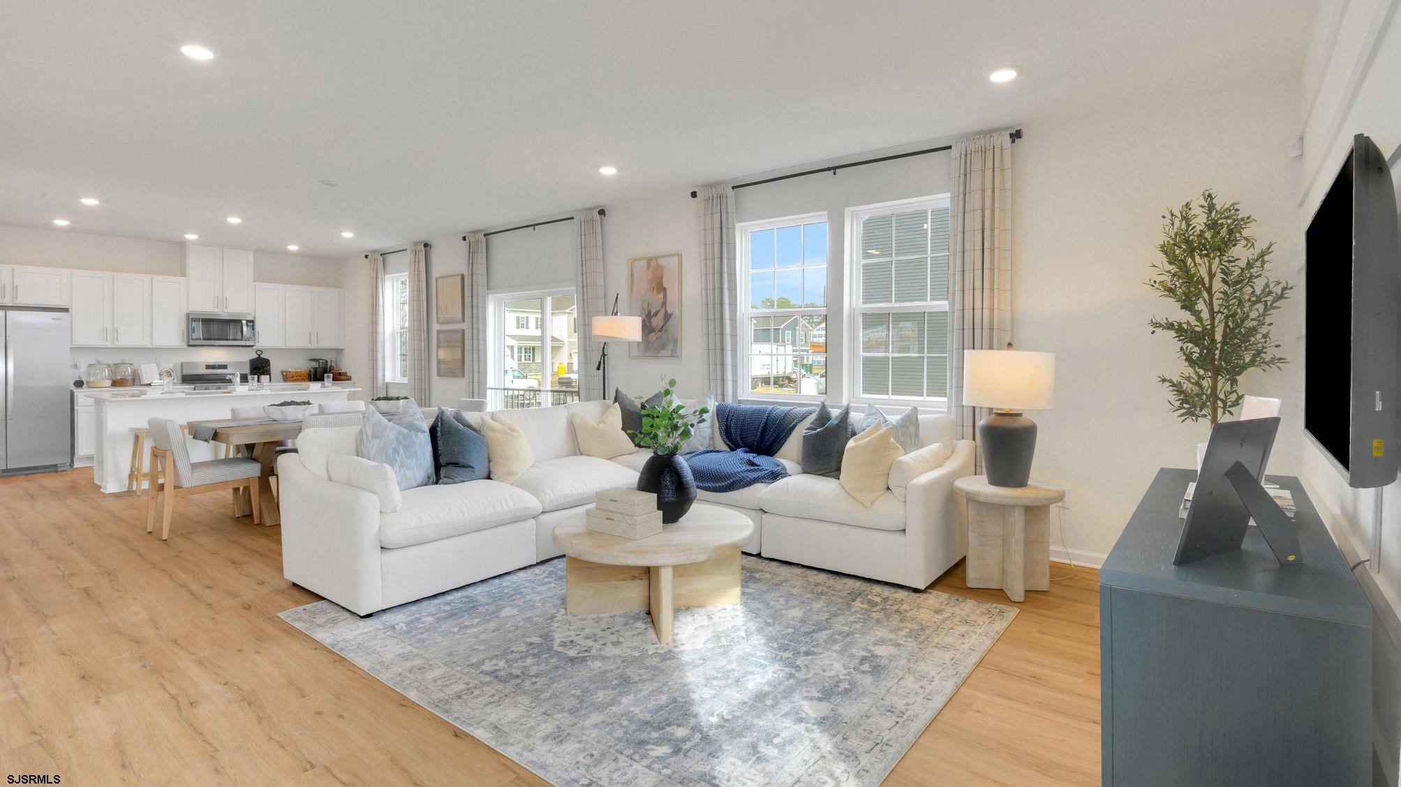 223 Daytona Road Egg Harbor Township, NJ 08234 - Photo 11 of 31 a living room with furniture and a large window