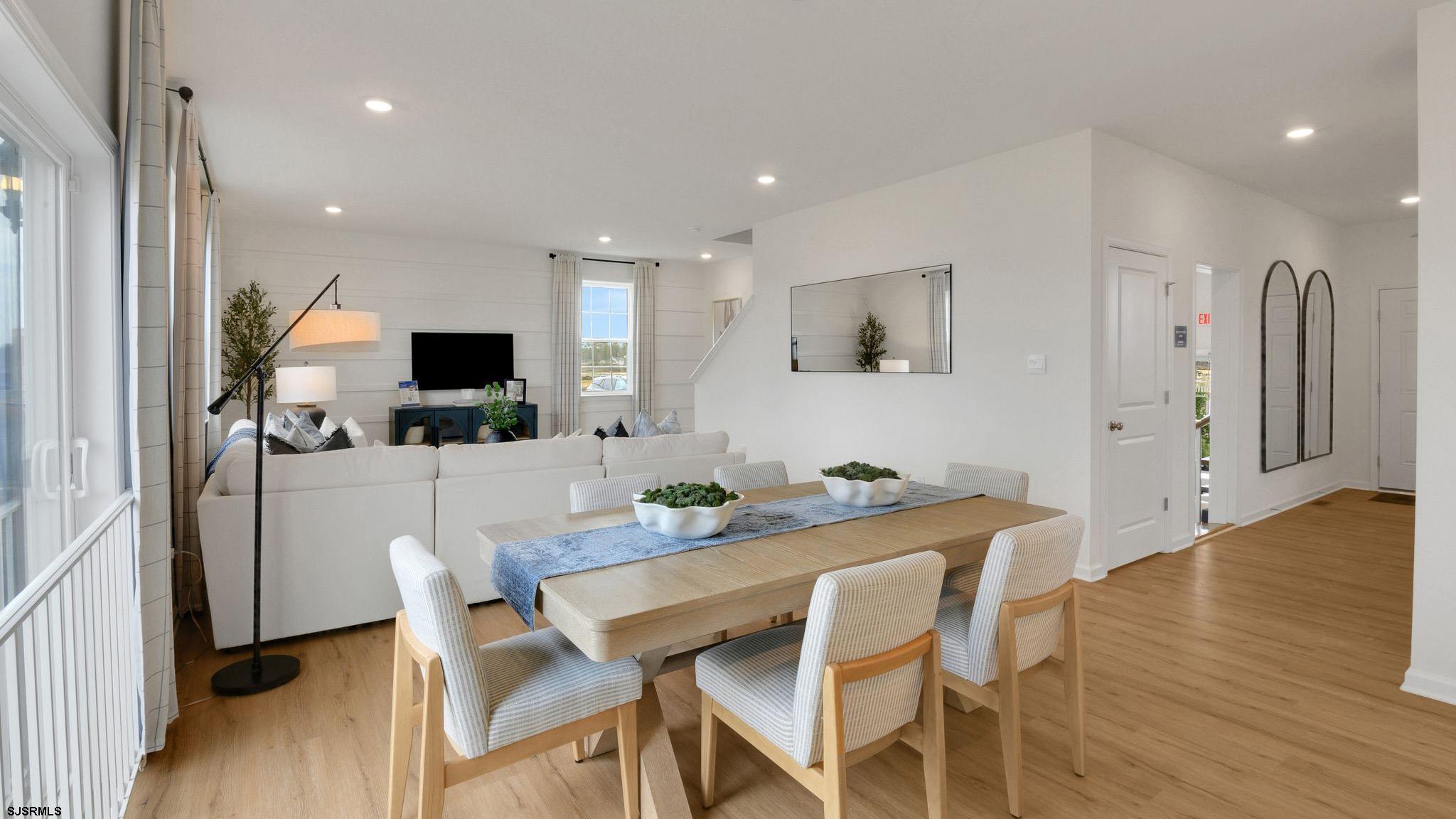 223 Daytona Road Egg Harbor Township, NJ 08234 - Photo 22 of 31 a view of a dining room with furniture and wooden floor