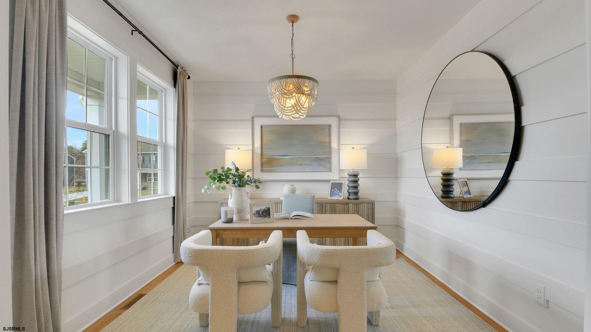 223 Daytona Road Egg Harbor Township, NJ 08234 - Photo 24 of 31 a view of a livingroom with furniture and a mirror