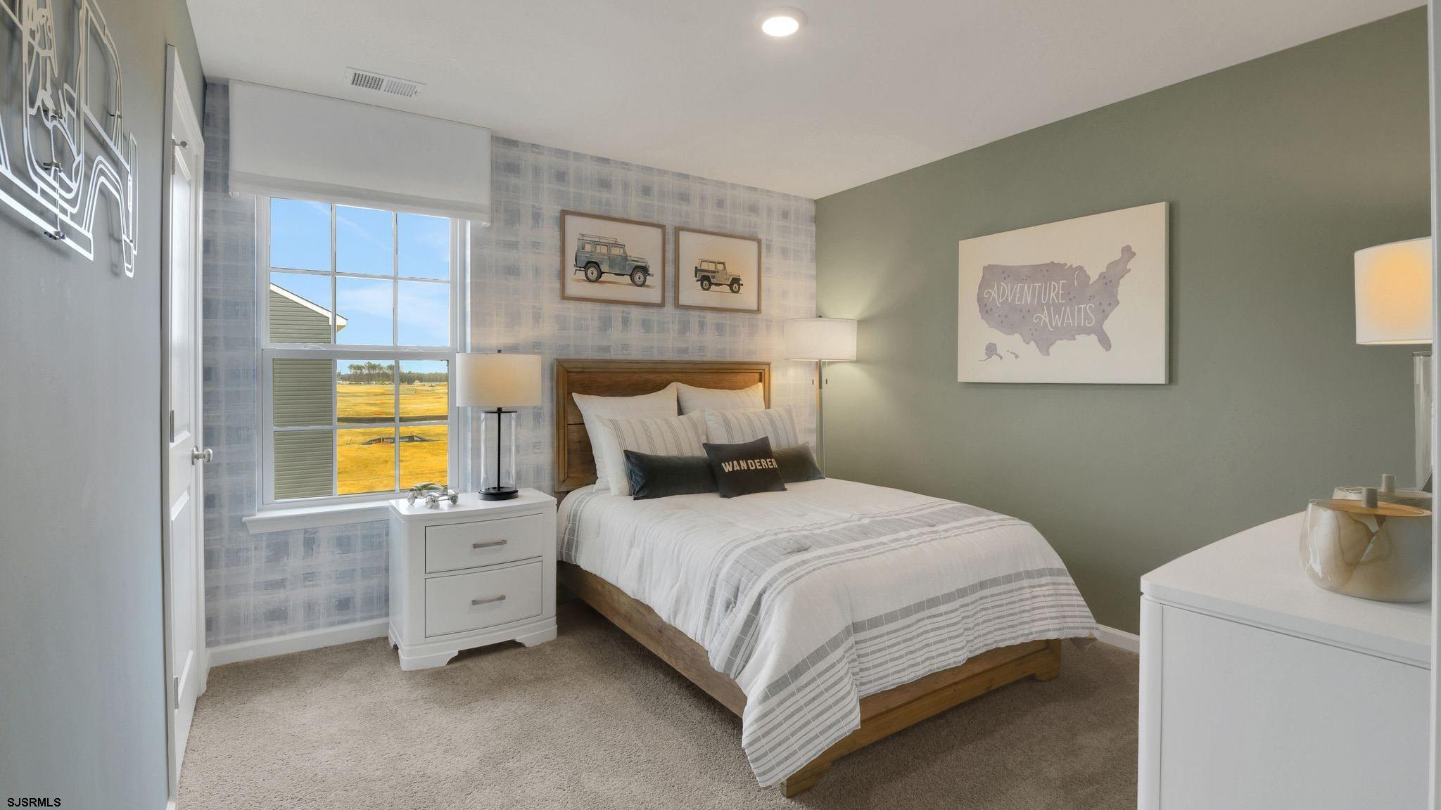 223 Daytona Road Egg Harbor Township, NJ 08234 - Photo 25 of 31 a bedroom with a bed and painting on the wall