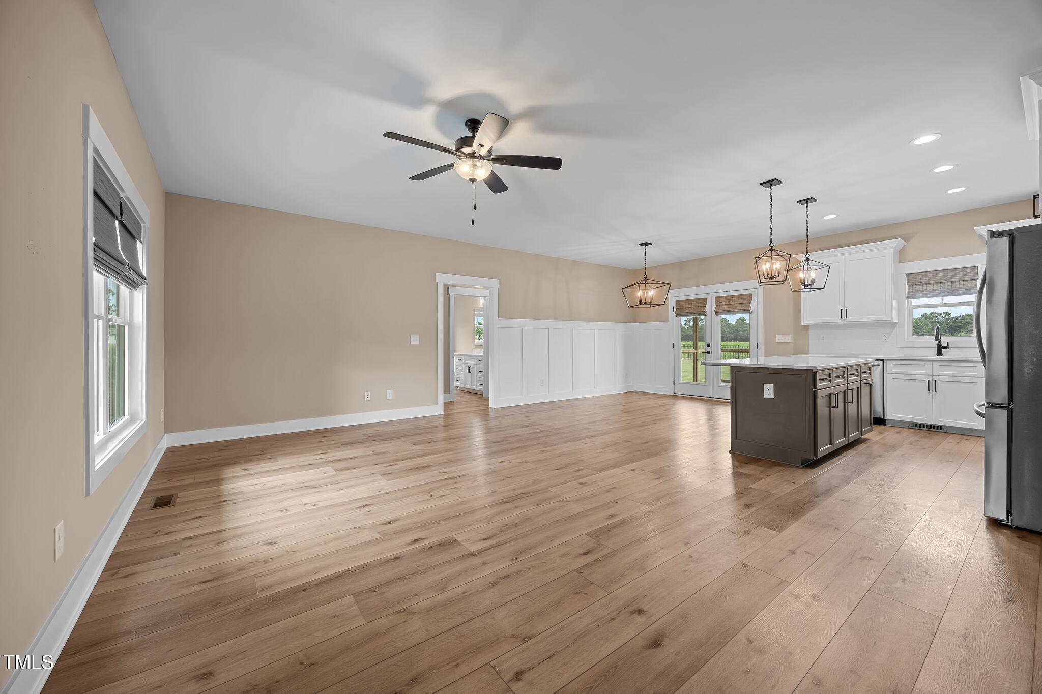 1270 Sheriff Johnson Road Angier, NC 27501 - Photo 10 of 50 a view of a kitchen with a sink a ceiling fan and kitchen view