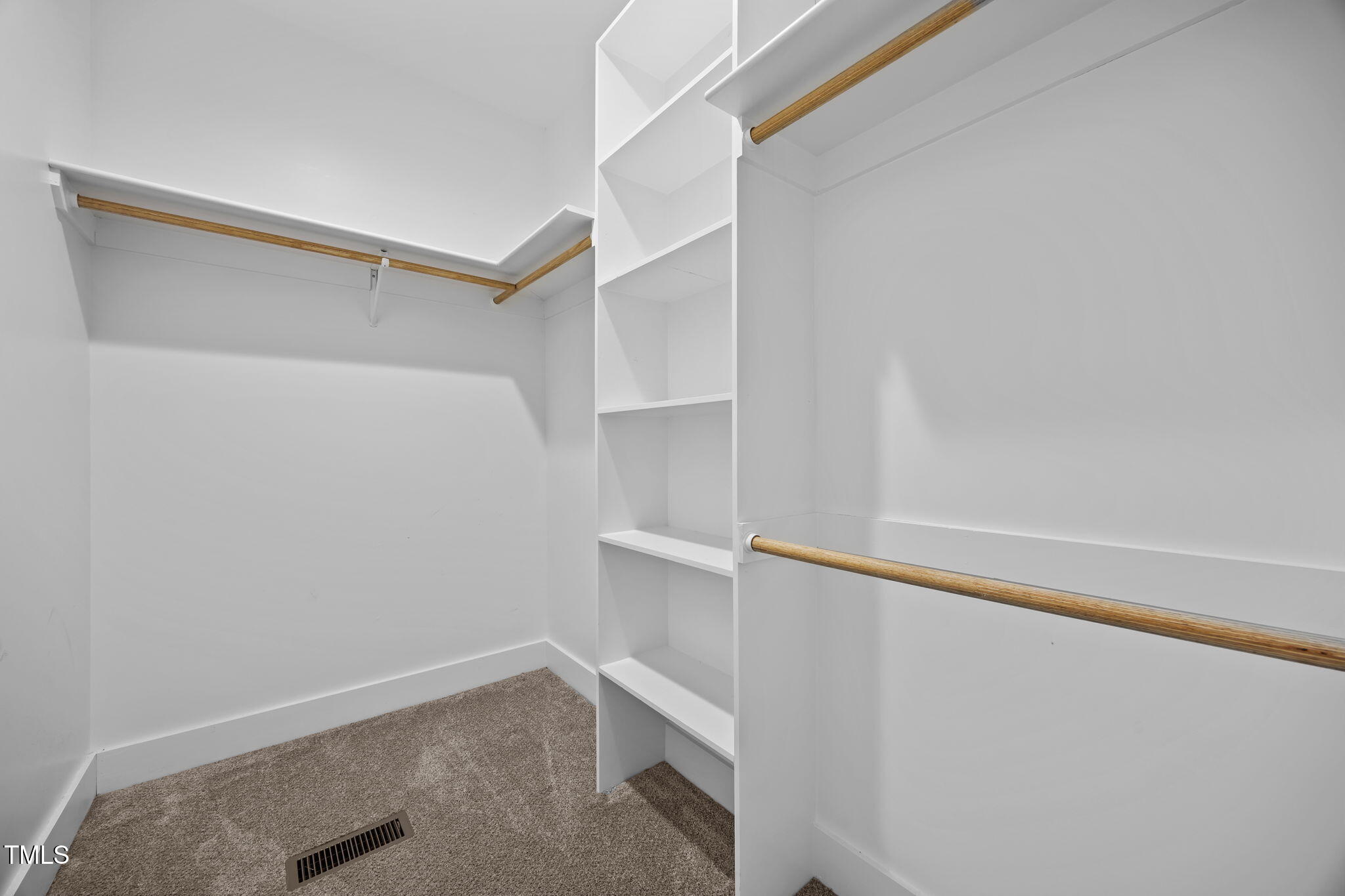 1270 Sheriff Johnson Road Angier, NC 27501 - Photo 16 of 50 a view of an empty walk in closet