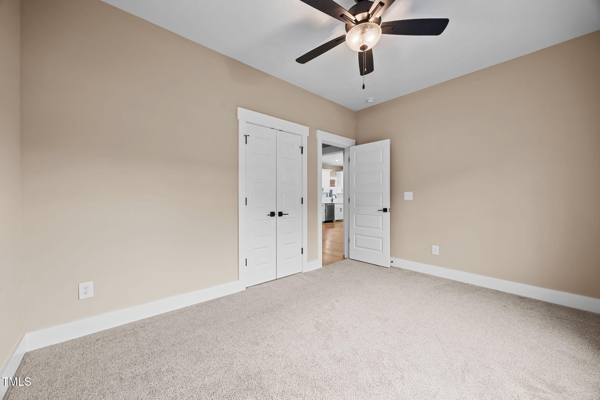 1270 Sheriff Johnson Road Angier, NC 27501 - Photo 18 of 50 an empty room with chandelier fan