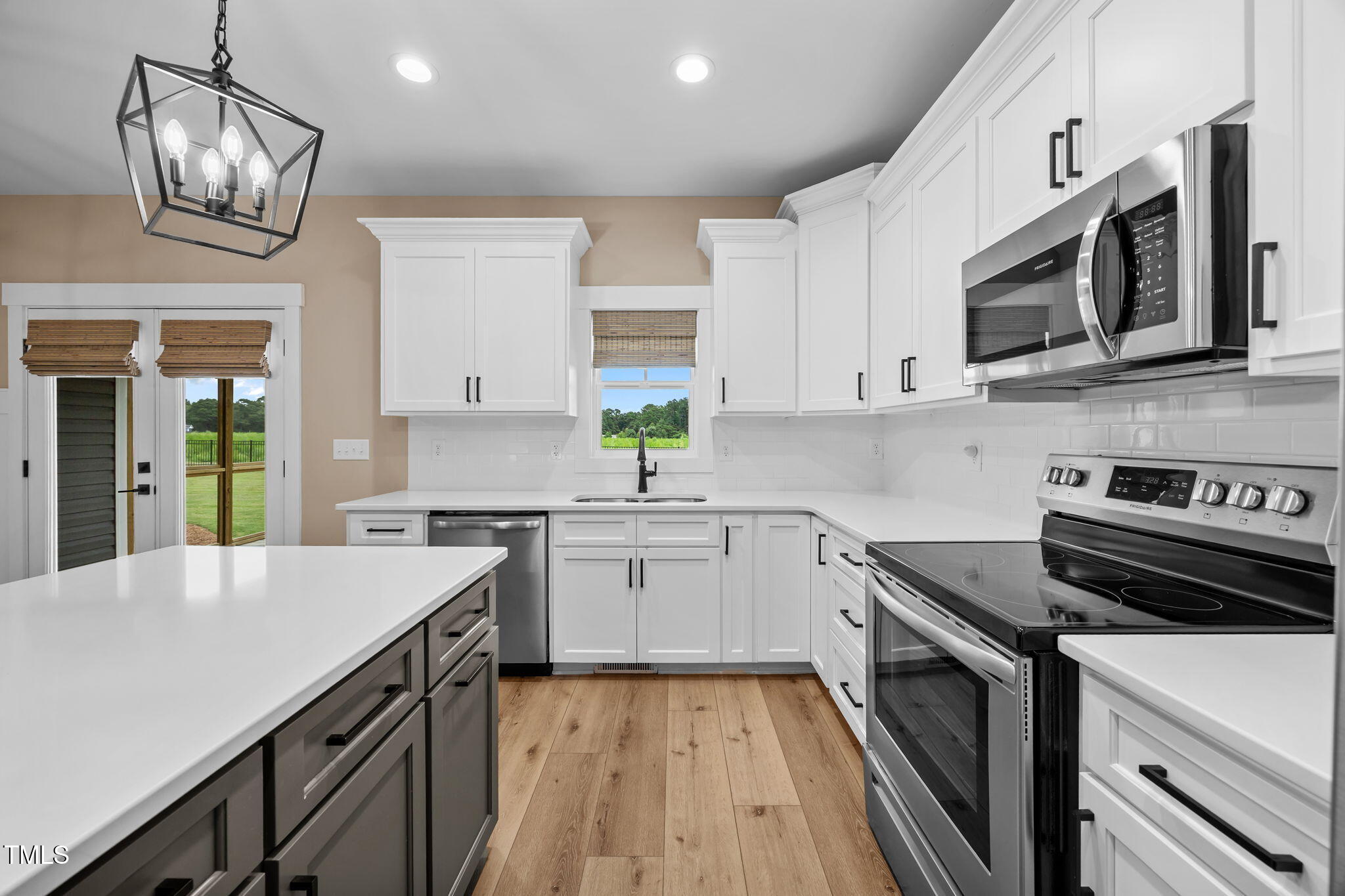 1270 Sheriff Johnson Road Angier, NC 27501 - Photo 2 of 50 a kitchen with stainless steel appliances a sink dishwasher a stove microwave and cabinets