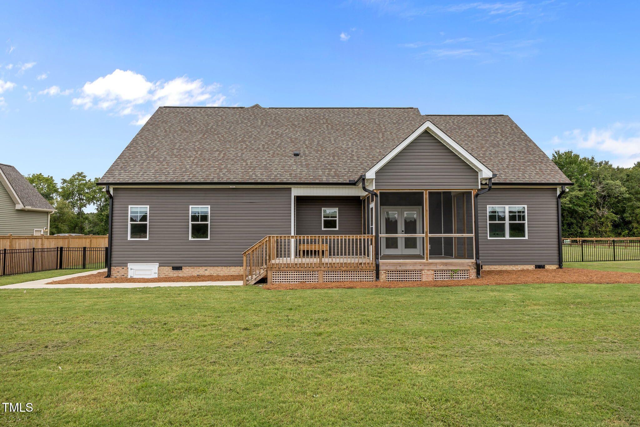 1270 Sheriff Johnson Road Angier, NC 27501 - Photo 27 of 50 a front view of house with yard outdoor seating and garage