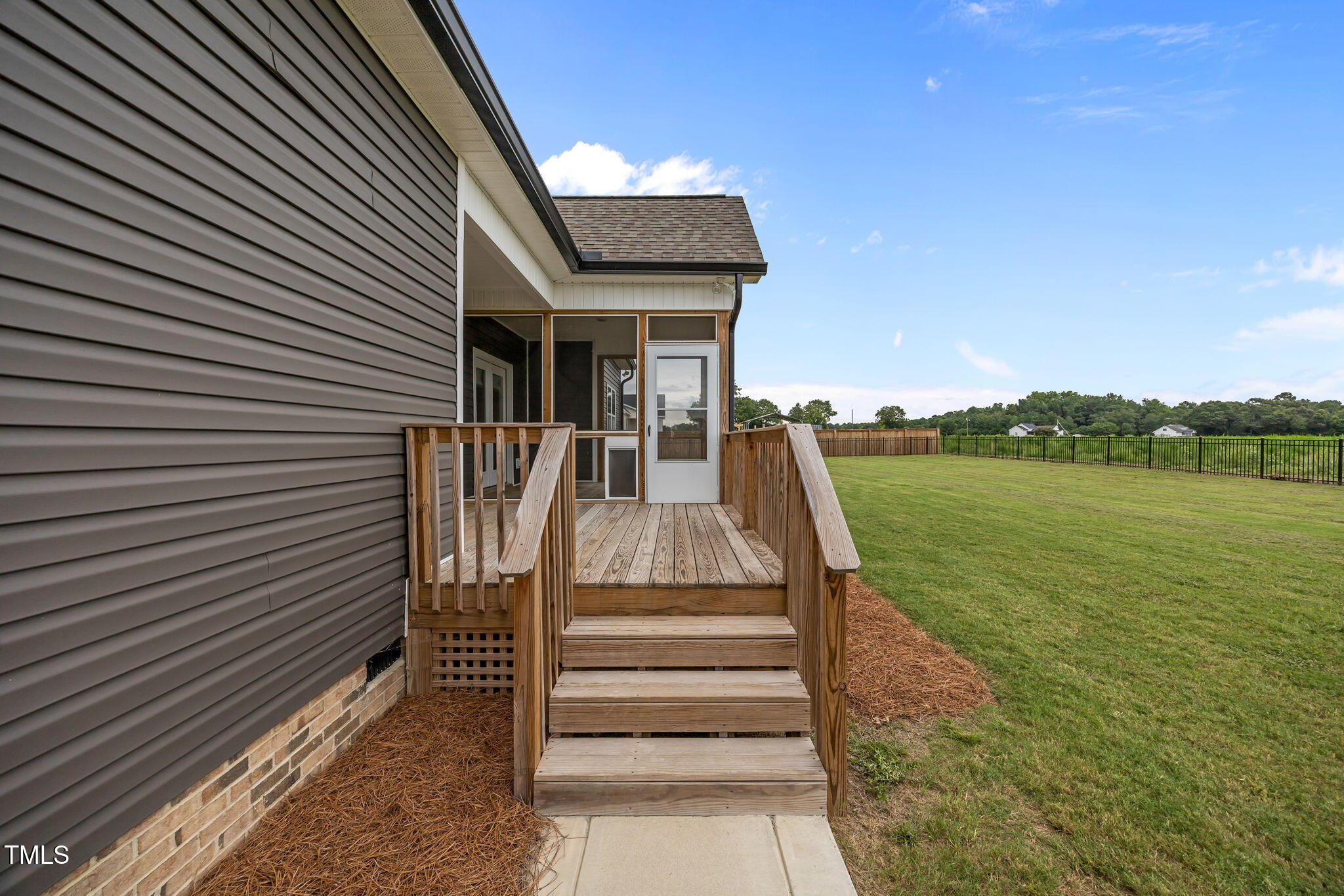1270 Sheriff Johnson Road Angier, NC 27501 - Photo 34 of 50 a view of a patio with lake view