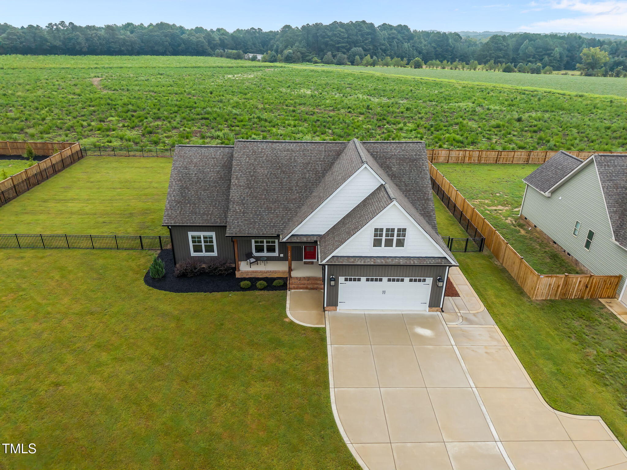1270 Sheriff Johnson Road Angier, NC 27501 - Photo 39 of 50 a view of a house with pool and a yard