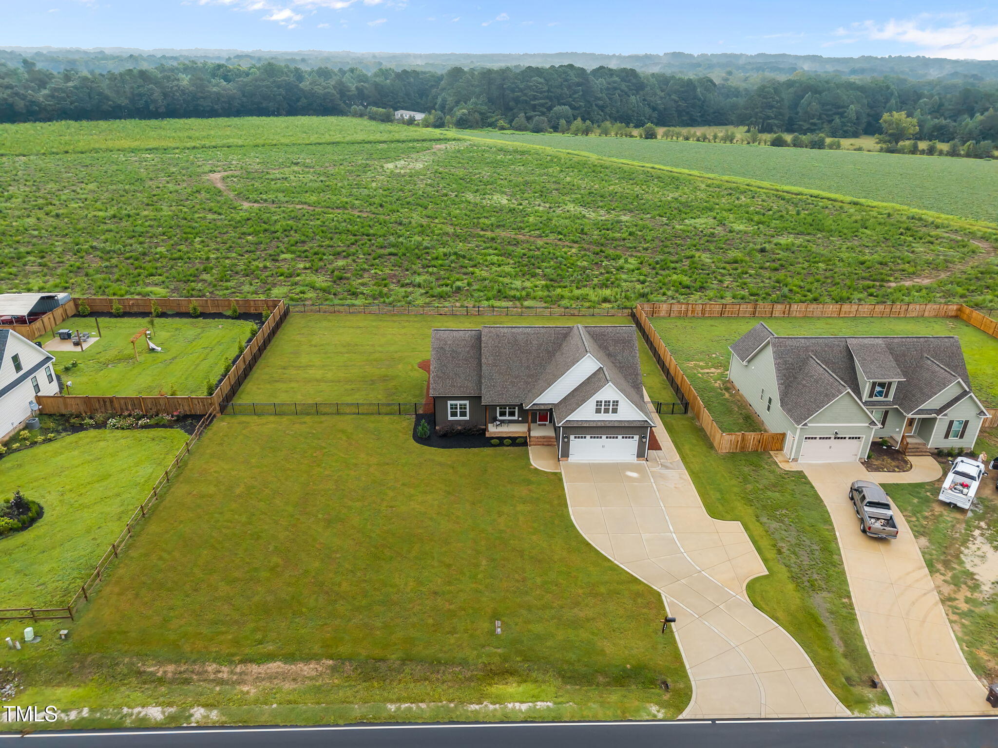 1270 Sheriff Johnson Road Angier, NC 27501 - Photo 40 of 50 a view of a lake with a yard