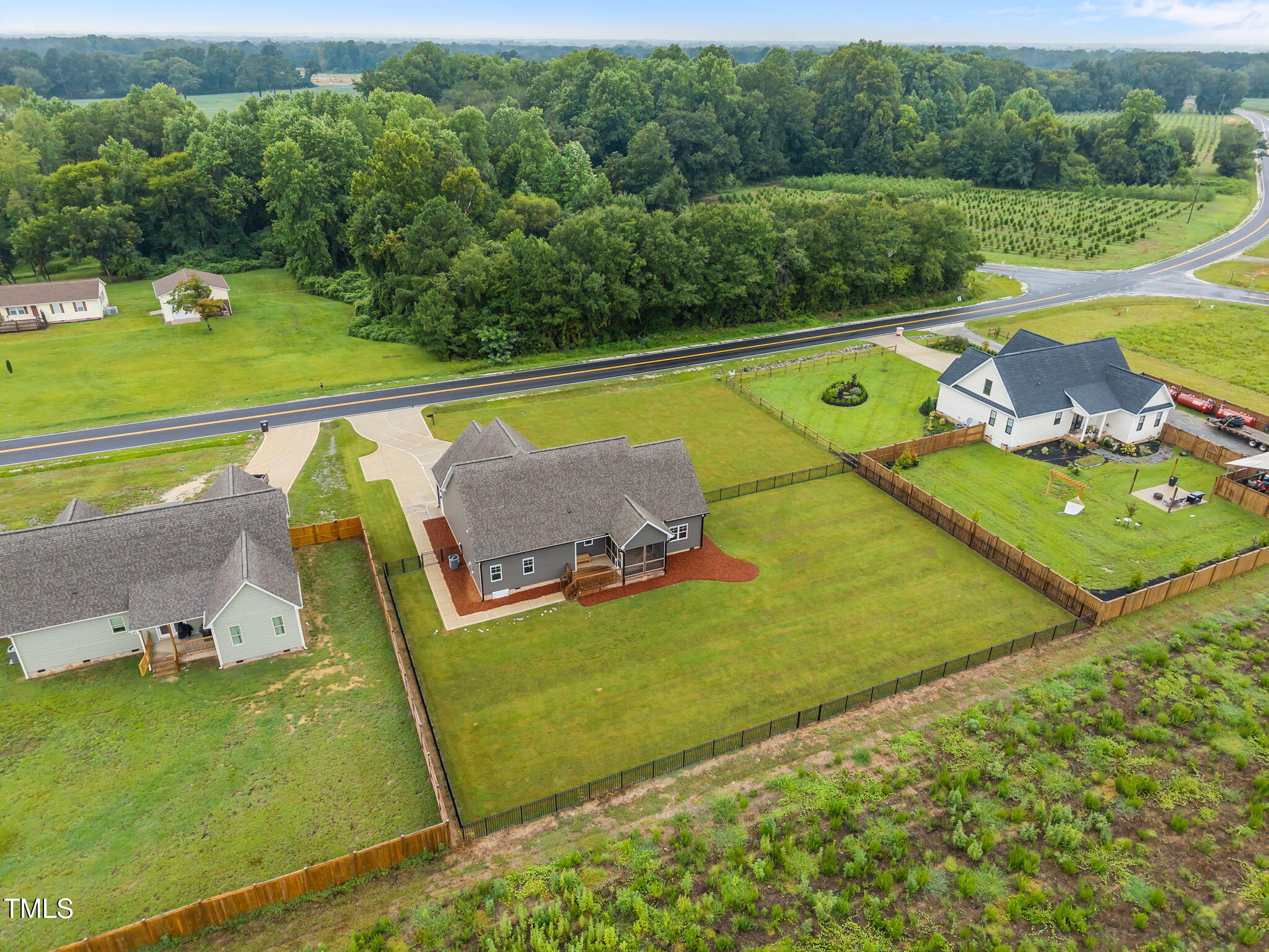1270 Sheriff Johnson Road Angier, NC 27501 - Photo 42 of 50 a view of a swimming pool with a yard and outdoor seating