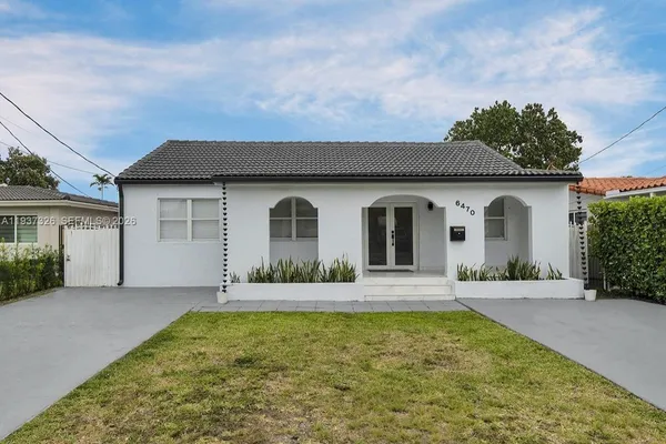 front view of house with a yard