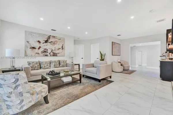 a living room with furniture and a couch