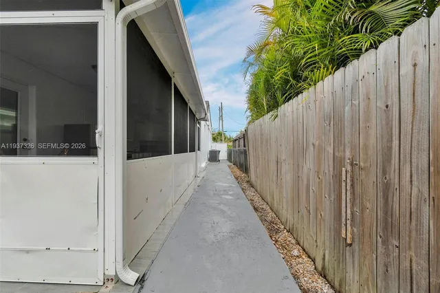 a view of livingroom with furniture and a window