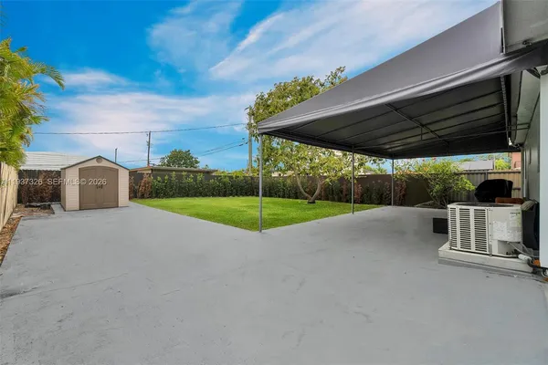 a view of a backyard with a garden