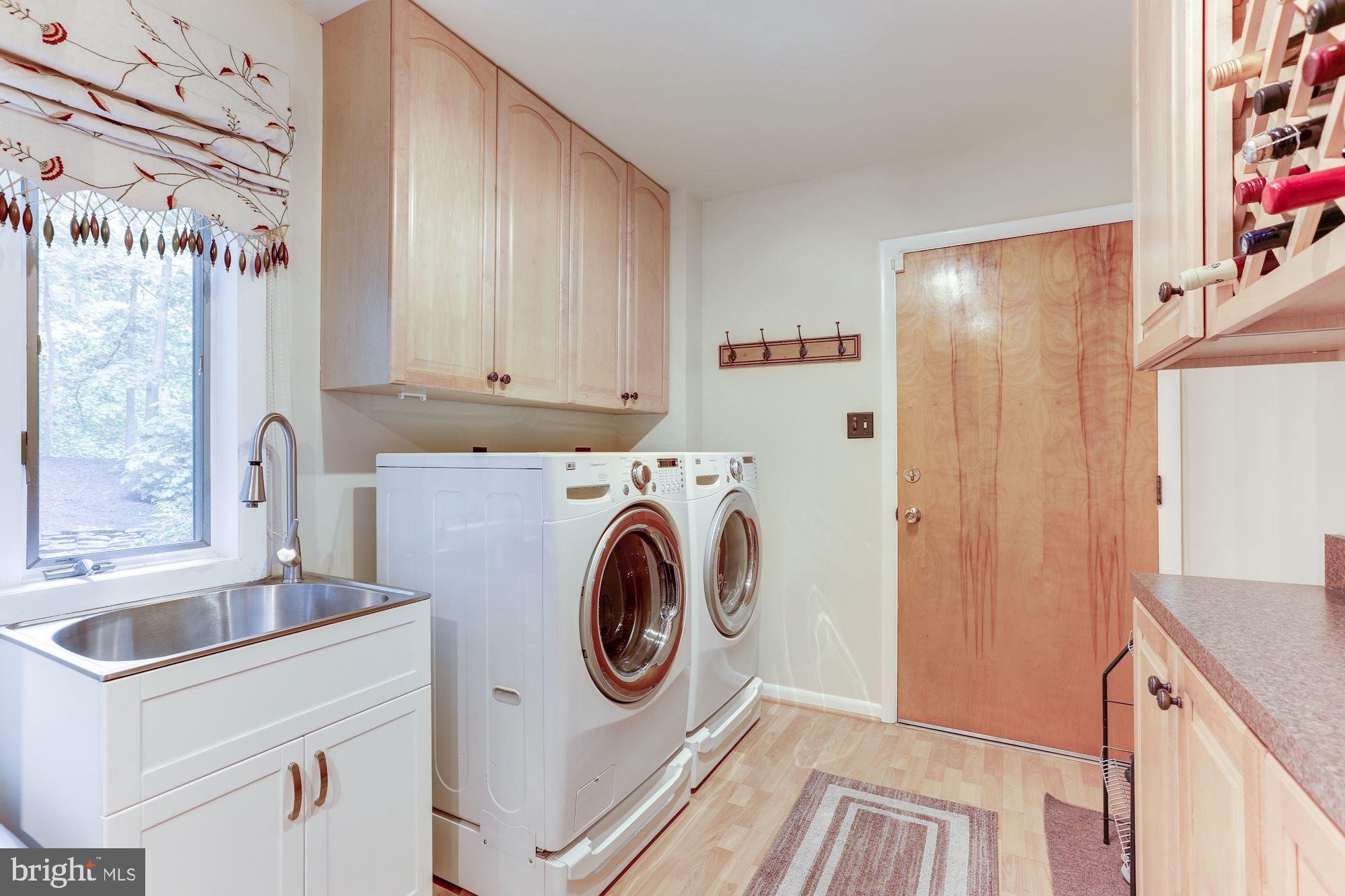 11583 Lake Newport Road Reston, VA 20194 - Photo 17 of 41 Washer and Dryer room on first floor