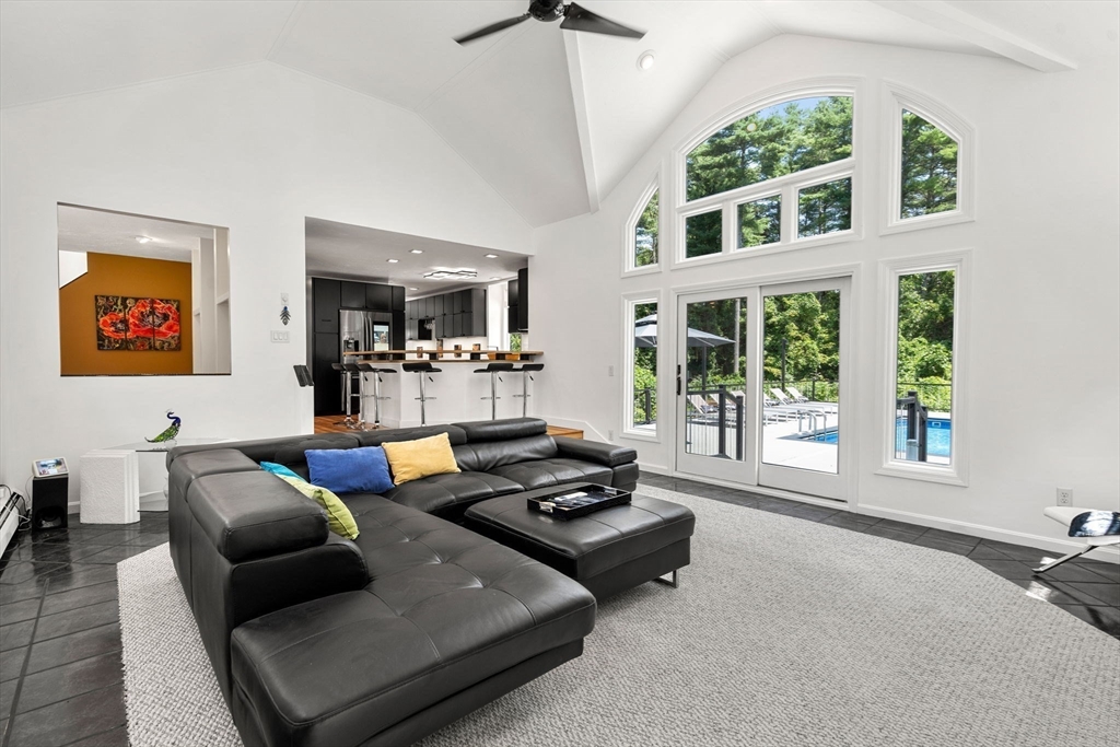 49 Parker Road Shirley, MA 01464 - Photo 14 of 42 a living room with furniture and a large window