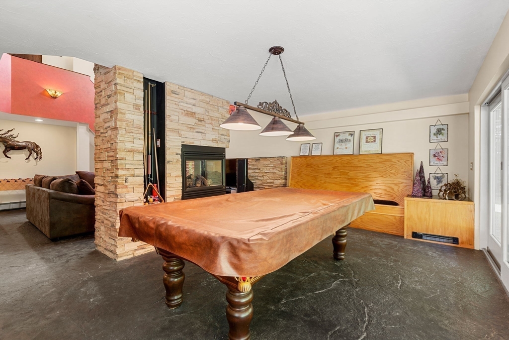 49 Parker Road Shirley, MA 01464 - Photo 21 of 42 a room with pool table and windows