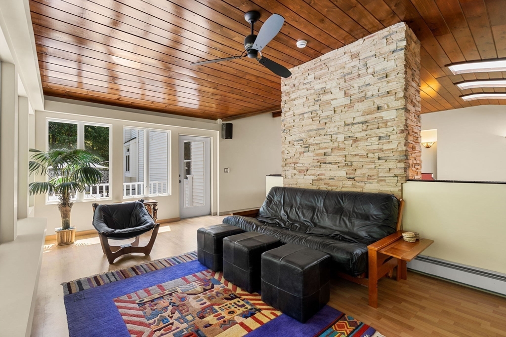 49 Parker Road Shirley, MA 01464 - Photo 22 of 42 a living room with furniture and wooden floor