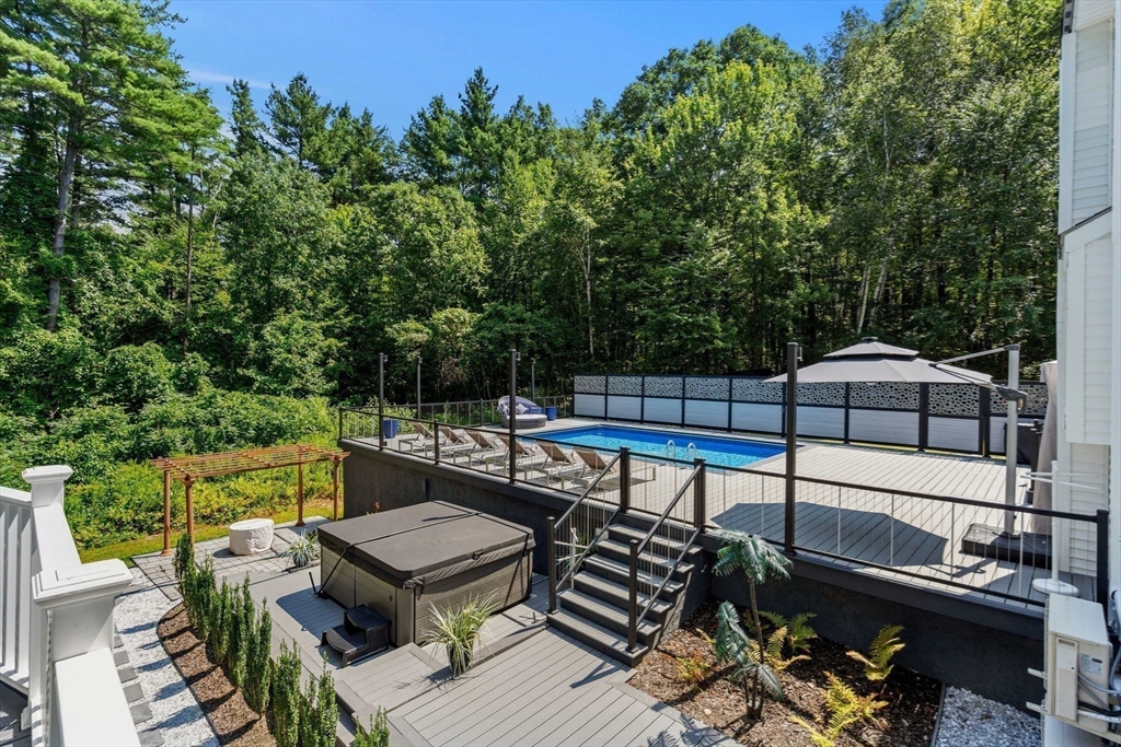 49 Parker Road Shirley, MA 01464 - Photo 38 of 42 a view of a terrace with furniture
