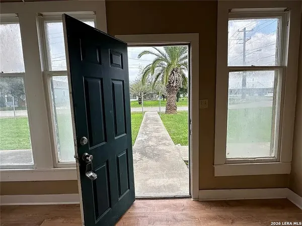a view of a door and the door of the house