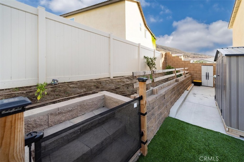 32078 Rambling Court Winchester, CA 92596 - Photo 46 of 48 a view of a backyard with sitting area