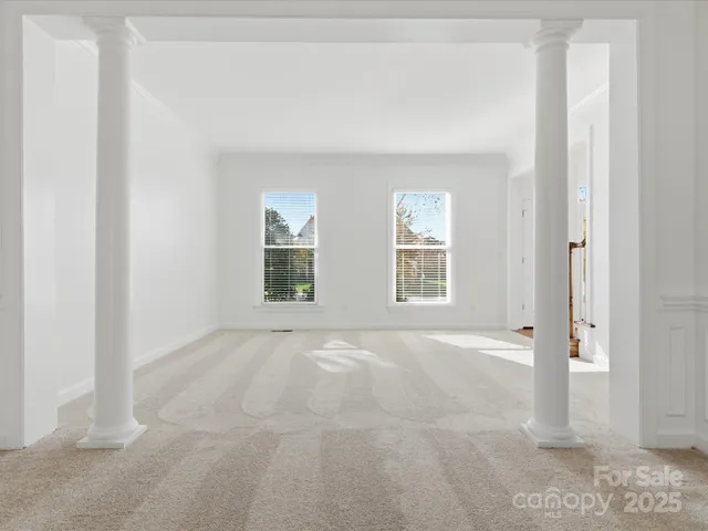 an empty room with windows