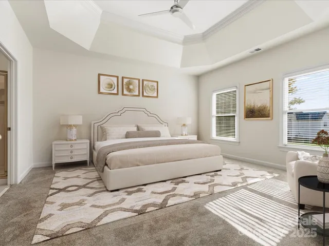 a bedroom with a bed wooden floor and window