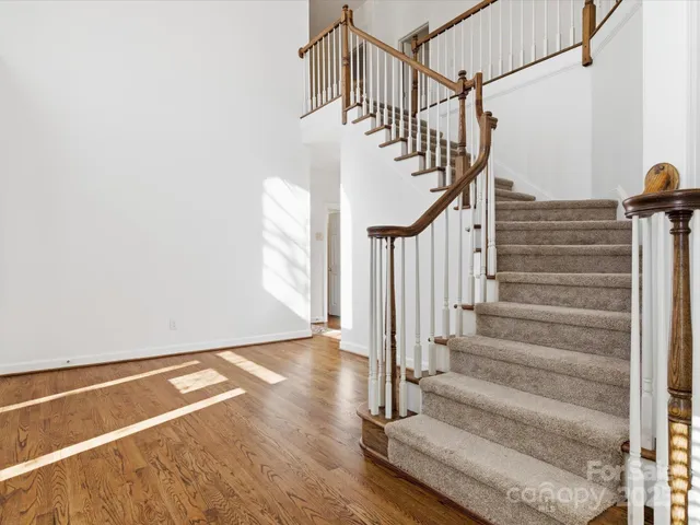 a view of entryway with wooden floor