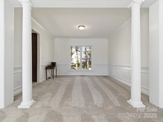 a view of an empty room and window