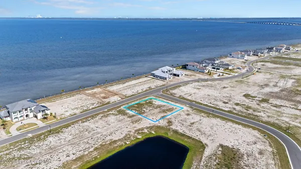 a view of a bed in a balcony
