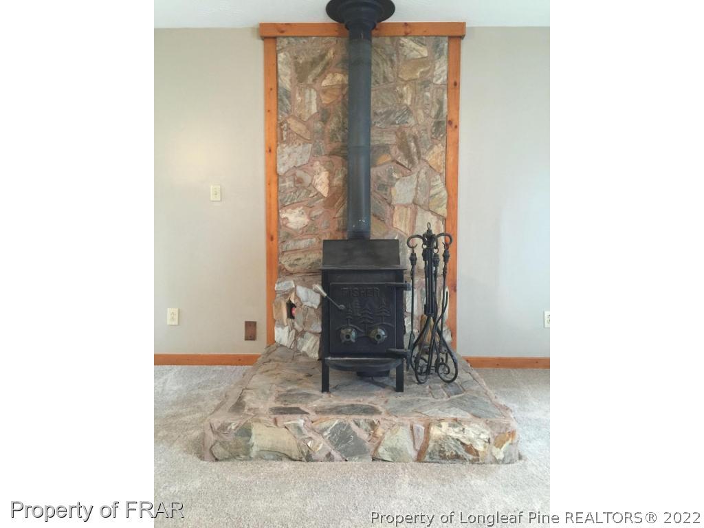 7685 Elliott Bridge Road Spring Lake, NC 28390 - Photo 22 of 26 a living room with furniture