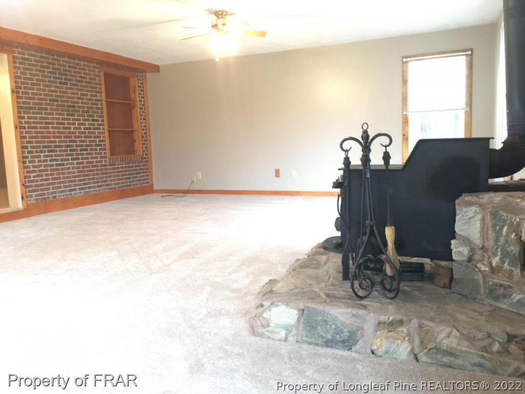 7685 Elliott Bridge Road Spring Lake, NC 28390 - Photo 23 of 26 a view of a room with window
