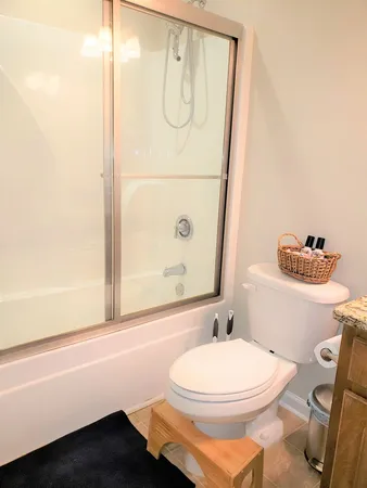 a view of a backyard of a house with a yard