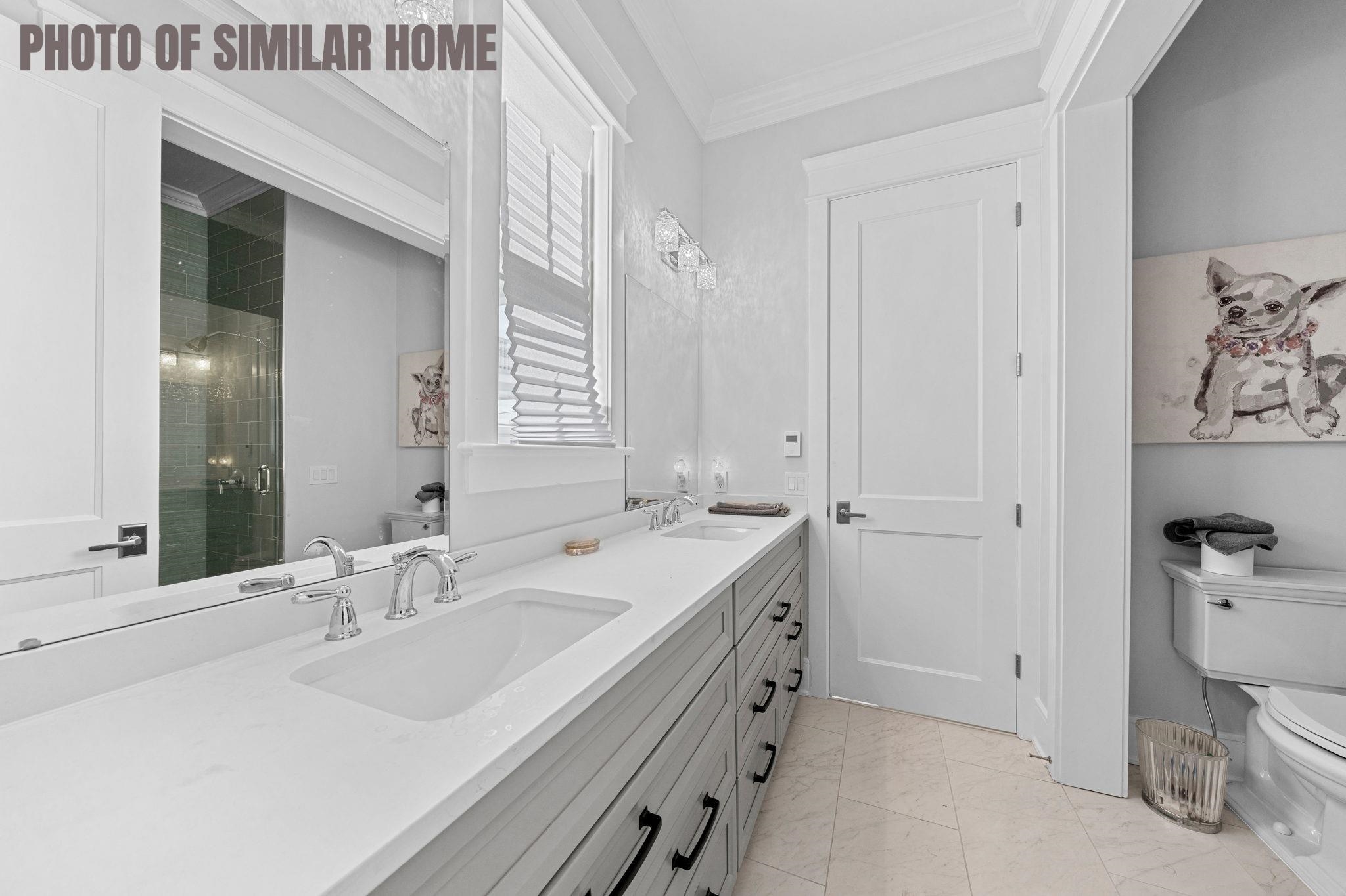 154 98th Street Stone Harbor, NJ 08247 - Photo 18 of 50 a bathroom with a sink and a mirror