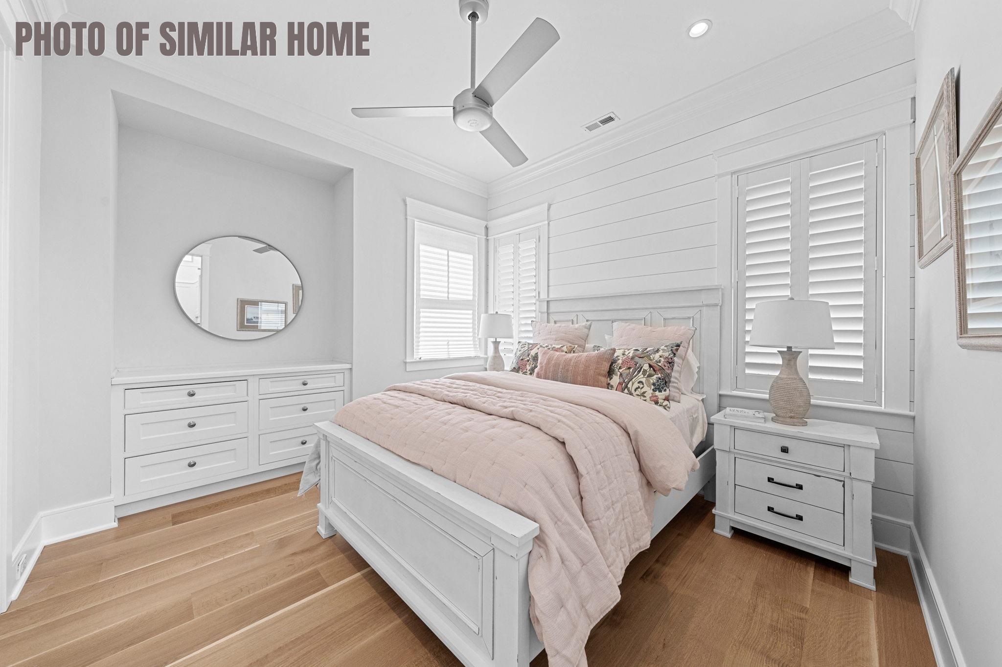 154 98th Street Stone Harbor, NJ 08247 - Photo 21 of 50 a bedroom with a bed a window and dresser