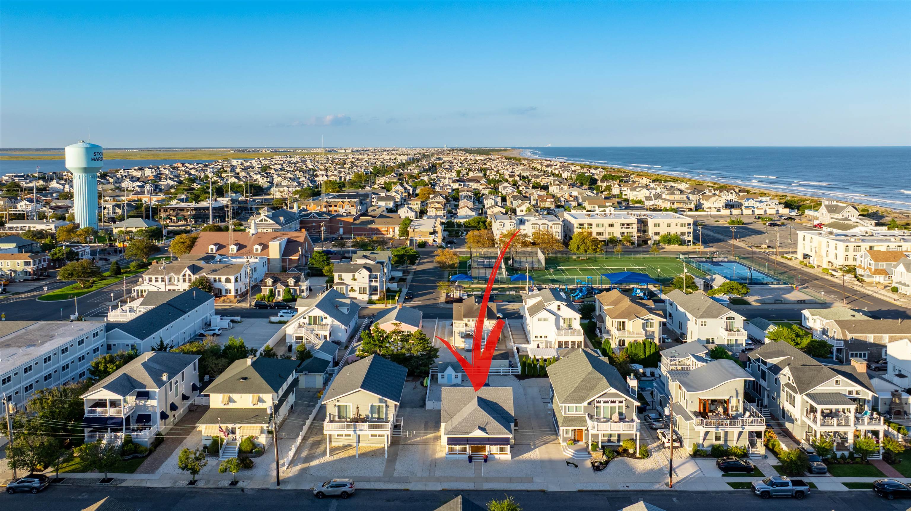 154 98th Street Stone Harbor, NJ 08247 - Photo 4 of 12 an aerial view of residential houses with outdoor space