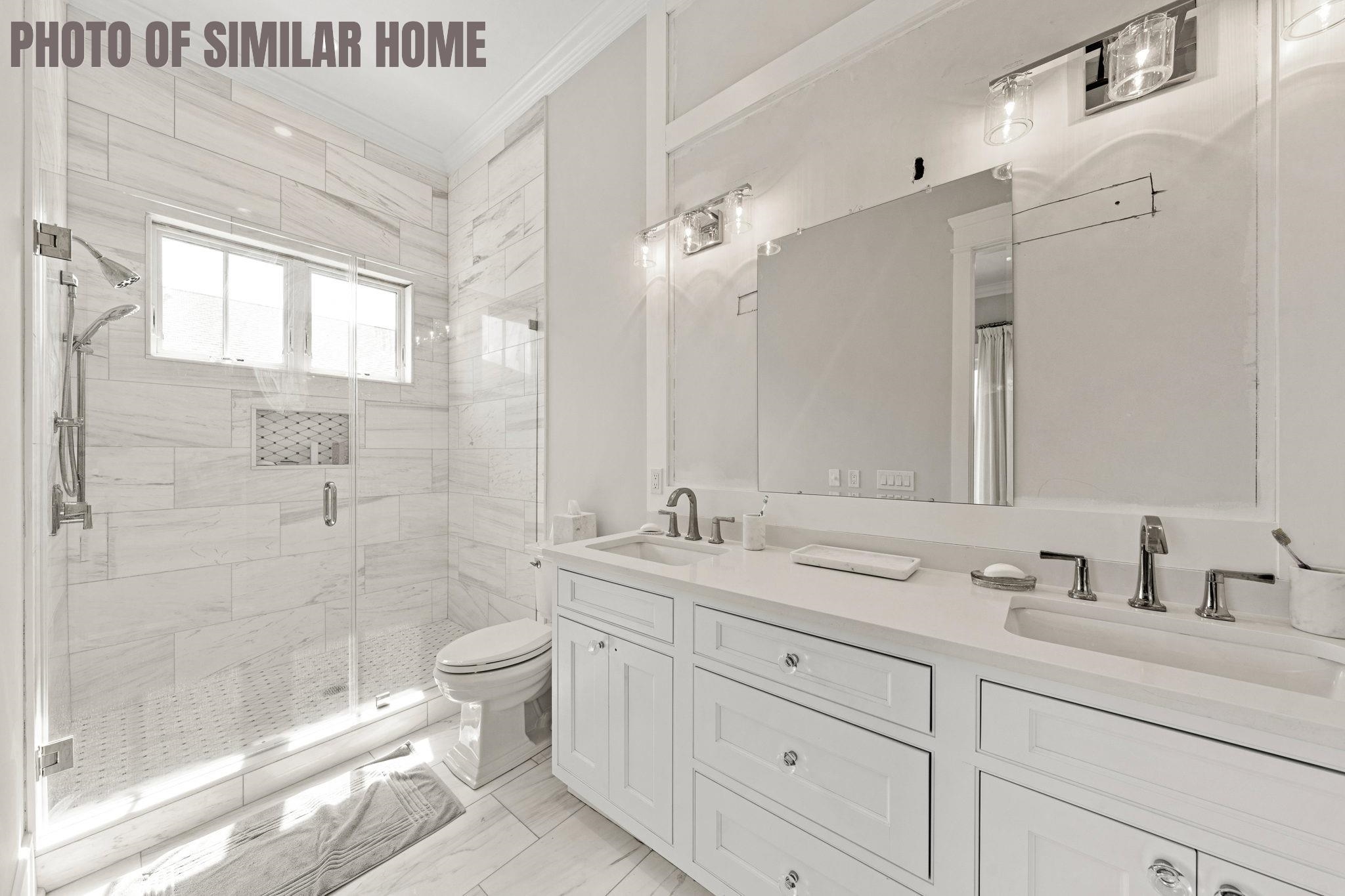 154 98th Street Stone Harbor, NJ 08247 - Photo 8 of 50 a bathroom with a double vanity sink toilet and shower
