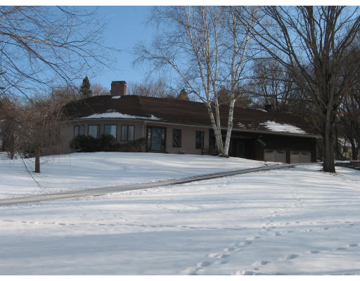34 Stagecoach Road Amherst, MA 01002 - Photo 1 of 1 a front view of a house with a yard