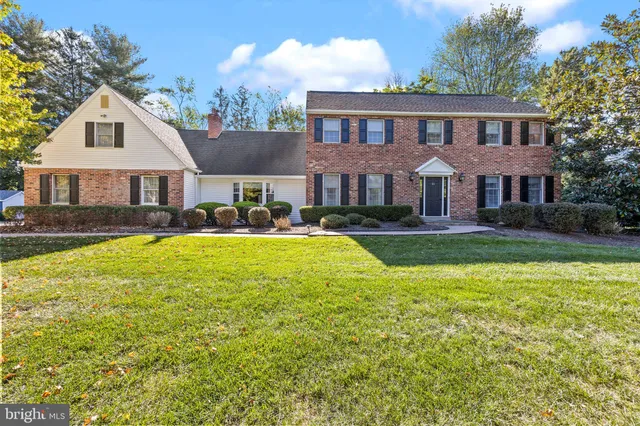a view of a house with a swimming pool