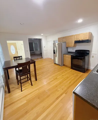 a bedroom with furniture and a bed